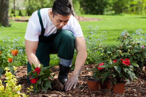 Gardening PPE laid out including boots, gloves and goggles